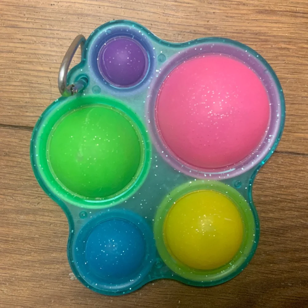 Bundle of 8 Pop-It Fidget Toys Including Notebook